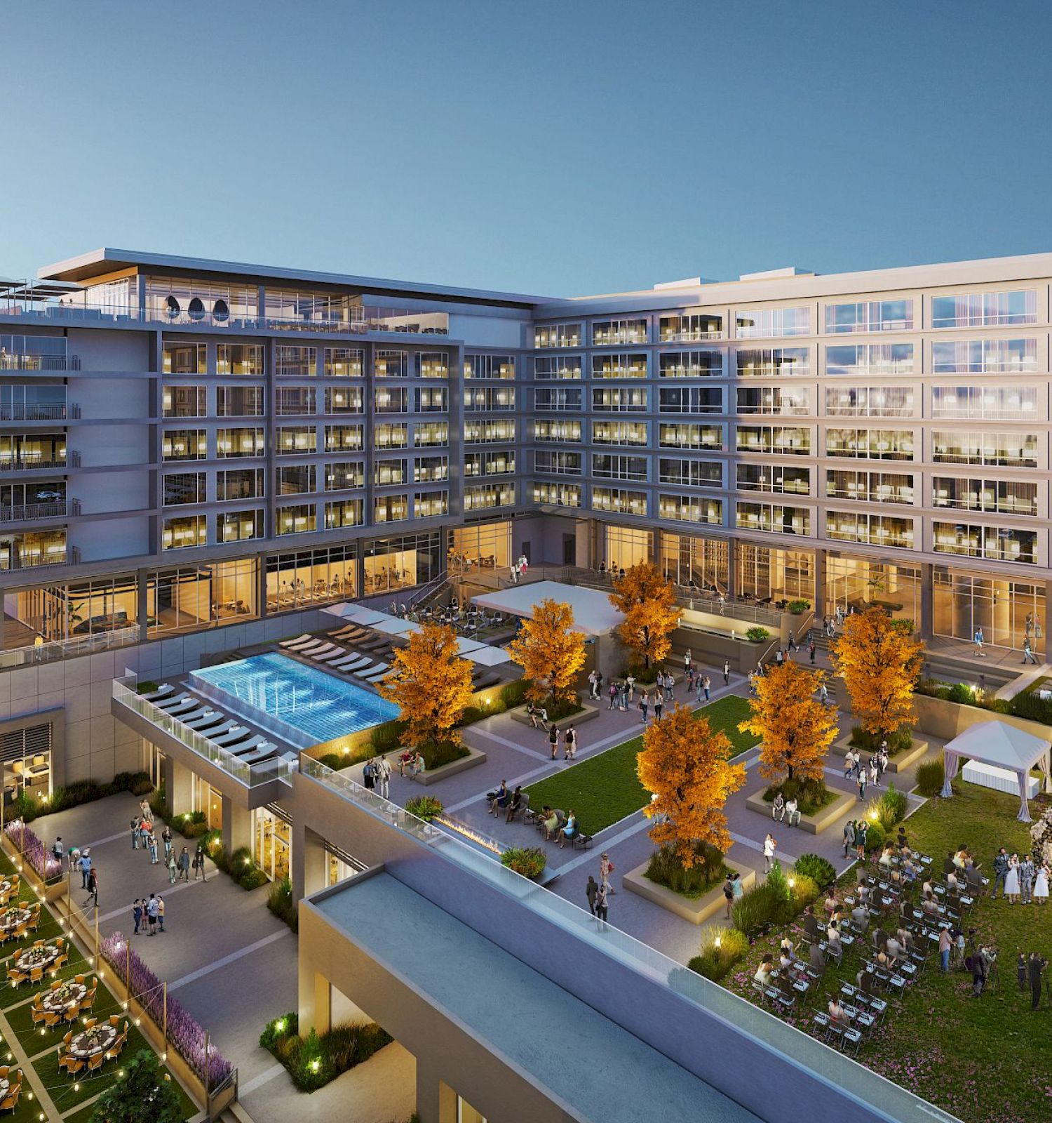 The image shows a large modern hotel or apartment complex with a pool, landscaped gardens, and outdoor seating areas, under a clear sky.