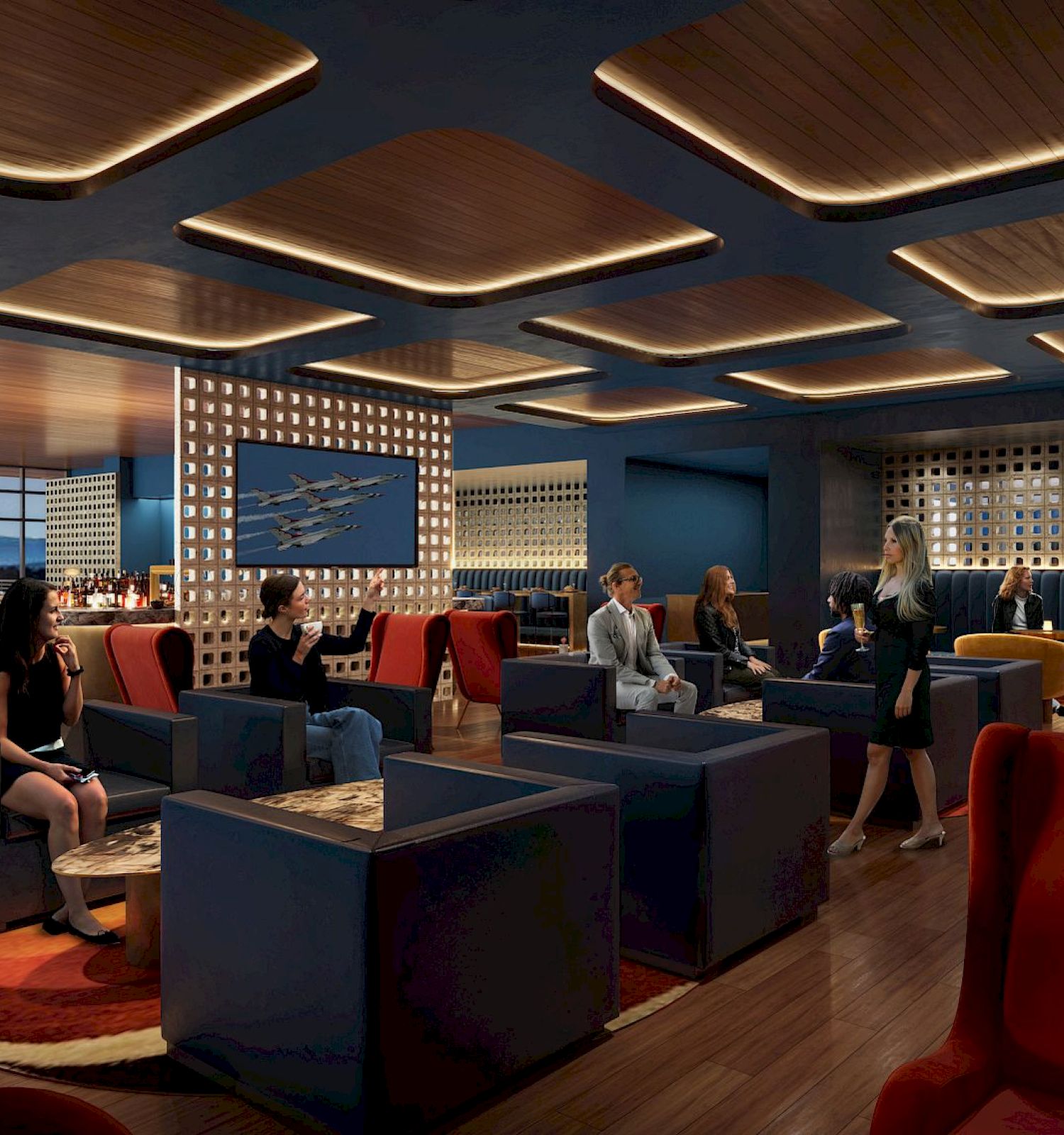 A modern lounge with people sitting and standing, featuring comfortable seating, ambient lighting, and a bar area in the background.